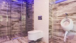 Marble bathroom with glass shower enclosure